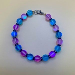 Iridescent, pink, and blue with hematite spacers